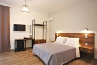 Posteľ alebo postele v izbe v ubytovaní Aethon Airport Project-FREE SHUTTLE by GK Properties