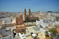 a view of a city from the roof of a building at Plaza Mina Suites - Adults Recommended by Luxury Suites Cadiz in Cádiz