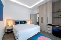 Posteľ alebo postele v izbe v ubytovaní M Mansion