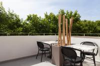 A balcony or terrace at Nivia Born Boutique Hotel