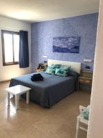 Posteľ alebo postele v izbe v ubytovaní Apartamentos El Bergantin Menorca Club