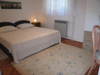 Posteľ alebo postele v izbe v ubytovaní Apartment Petrinic V