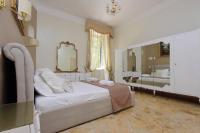 Posteľ alebo postele v izbe v ubytovaní 4BNB - Luxury Mazzini Apartment