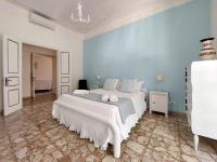 Posteľ alebo postele v izbe v ubytovaní 4BNB - Luxury Mazzini Apartment