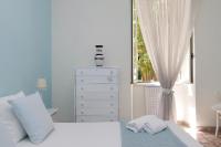 Posteľ alebo postele v izbe v ubytovaní 4BNB - Luxury Mazzini Apartment