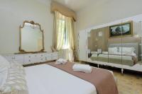 Posteľ alebo postele v izbe v ubytovaní 4BNB - Luxury Mazzini Apartment