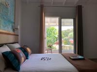 Postel nebo postele na pokoji v ubytování Enigma Suites