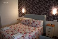 Posteľ alebo postele v izbe v ubytovaní Hostal El Puerto Boutique