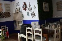 Reštaurácia alebo iné gastronomické zariadenie v ubytovaní Hostal El Puerto Boutique