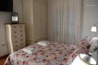 Posteľ alebo postele v izbe v ubytovaní Hostal El Puerto Boutique