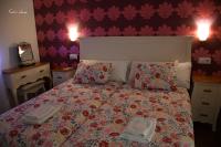 Posteľ alebo postele v izbe v ubytovaní Hostal El Puerto Boutique