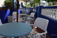 Reštaurácia alebo iné gastronomické zariadenie v ubytovaní Hostal El Puerto Boutique