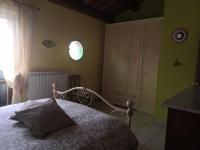 Postel nebo postele na pokoji v ubytování A Casa di Claudia