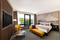 Posteľ alebo postele v izbe v ubytovaní Grand Hotel Esztergom