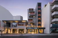 a building with a sign that reads imperial city hotel at Hyperion City Hotel &amp; Spa in Chania Town