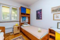 Postel nebo postele na pokoji v ubytování Apartment Fedora
