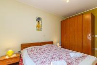 Postel nebo postele na pokoji v ubytování Apartment Fedora