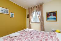 Postel nebo postele na pokoji v ubytování Apartment Fedora