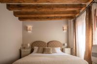Posteľ alebo postele v izbe v ubytovaní Corte Contarina San Marco Apartment R&R