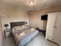 Posteľ alebo postele v izbe v ubytovaní Apartments Villa Chiara Opatija