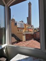A balcony or terrace at Asinelli, Bologna by Short Holidays