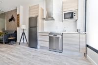 Kuchyň nebo kuchyňský kout v ubytování APARTAMENTOS AVENIDA DE AMERICA