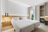Posteľ alebo postele v izbe v ubytovaní Hotel Areca
