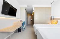 Posteľ alebo postele v izbe v ubytovaní Hotel Areca