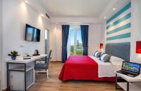 A television and/or entertainment centre at Hotel Angelina