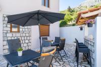 Patio alebo iná vonkajšia časť ubytovania Apartments Villa Made 4U