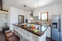 Kuchyňa alebo kuchynka v ubytovaní Apartments Villa Made 4U