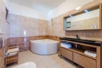Kúpeľňa v ubytovaní Apartments Villa Made 4U