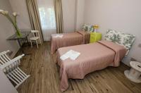 Posteľ alebo postele v izbe v ubytovaní Poggio al Sole