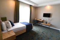 TV a/nebo společenská místnost v ubytování Sera Nature Hotel & Spa