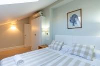 Postel nebo postele na pokoji v ubytování Urbe10 Angel Suites 2 Bedrooms Apartment 4A