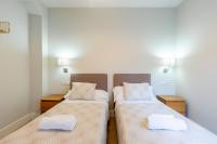Postel nebo postele na pokoji v ubytování Urbe10 Angel Suites 2 Bedrooms Apartment 4A