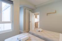 Postel nebo postele na pokoji v ubytování Urbe10 Angel Suites 2 Bedrooms Apartment 4A