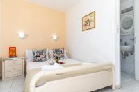 Posteľ alebo postele v izbe v ubytovaní Rooms Maria