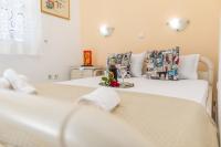 Posteľ alebo postele v izbe v ubytovaní Rooms Maria