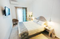 Postel nebo postele na pokoji v ubytování Floresita apartment