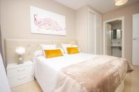 Posteľ alebo postele v izbe v ubytovaní Holiday Deluxe Apartment Miramar Magic World