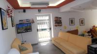 A television and/or entertainment centre at Hotel Ciao Bed & Breakfast