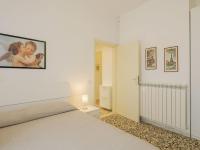 A bed or beds in a room at Holiday Home Manuela by Interhome
