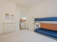 A bed or beds in a room at Holiday Home Manuela by Interhome