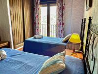 Posteľ alebo postele v izbe v ubytovaní Villa La Posada