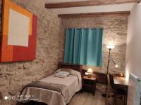 A bed or beds in a room at CASA SARTZALETA-Navarra-España
