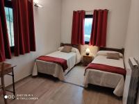 A bed or beds in a room at CASA SARTZALETA-Navarra-España