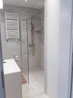 Kúpeľňa v ubytovaní Apartament Bella Rosa z podziemnym parkingiem