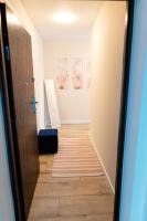 Posteľ alebo postele v izbe v ubytovaní Apartament Bella Rosa z podziemnym parkingiem