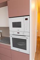 Kuchyňa alebo kuchynka v ubytovaní Apartament Bella Rosa z podziemnym parkingiem